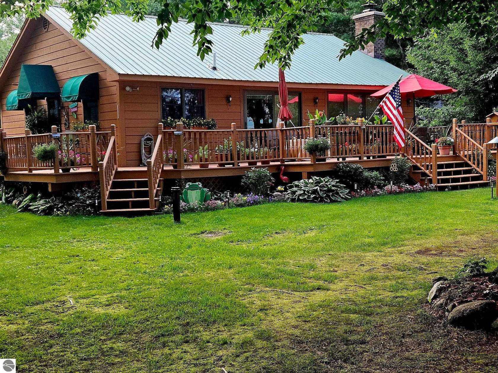 11.9 Acres of Land with Home for Sale in Kalkaska, Michigan