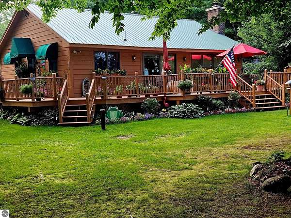 11.9 Acres of Land with Home for Sale in Kalkaska, Michigan