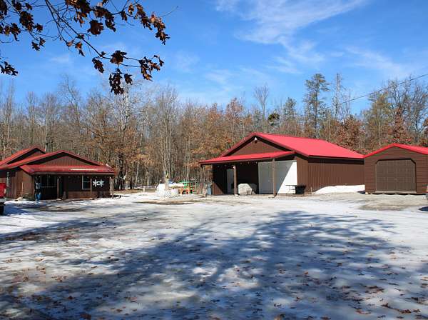 12.7 Acres of Recreational Land with Home for Sale in Luzerne, Michigan