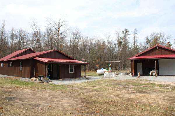 12.7 Acres of Land with Home for Sale in Luzerne, Michigan