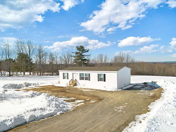 2.13 Acres of Land with Home for Sale in China, Maine