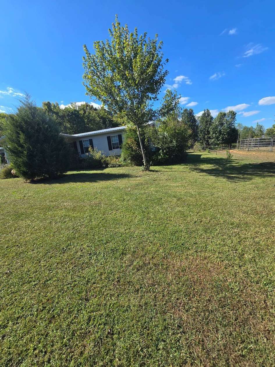 6.34 Acres of Land with Home for Sale in Glasgow, Kentucky