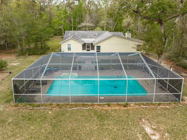 2.44 Acres of Land with Home for Sale in Crawfordville, Florida