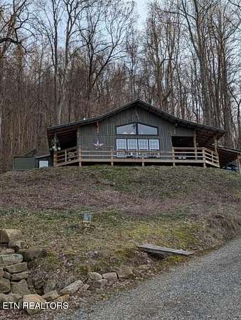 14.4 Acres of Recreational Land with Home for Sale in Thorn Hill, Tennessee