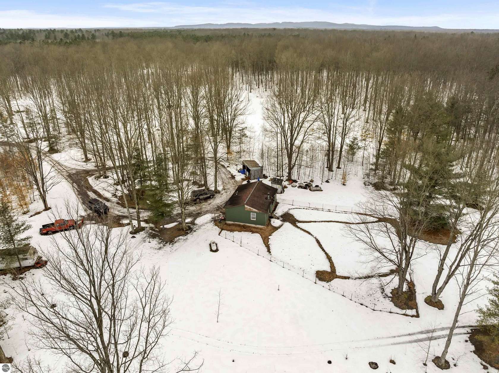 25.4 Acres of Recreational Land with Home for Sale in Beulah, Michigan