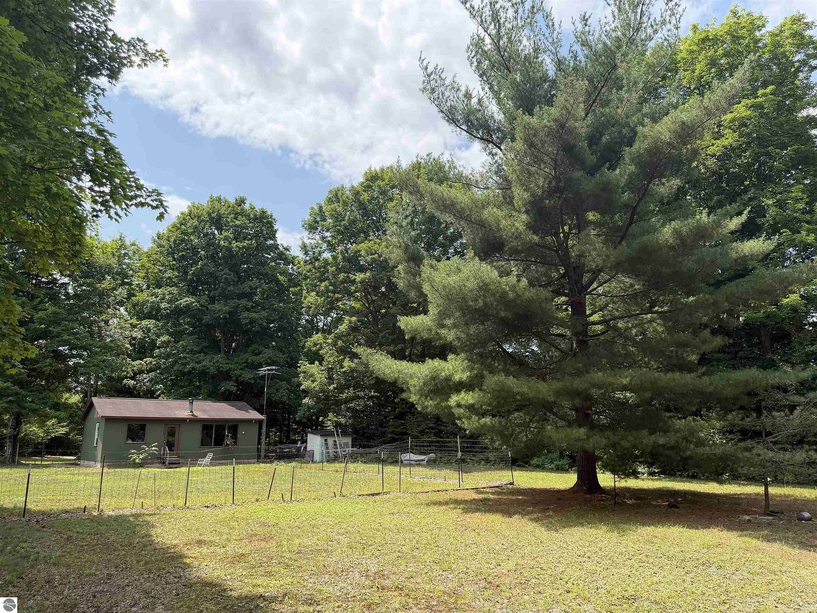 25.4 Acres of Recreational Land with Home for Sale in Beulah, Michigan