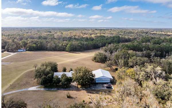 4.7 Acres of Land with Home for Sale in Lake City, Florida