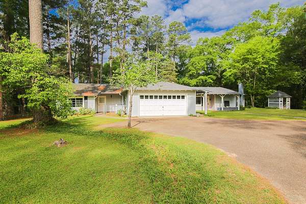 4.19 Acres of Land with Home for Sale in Marshall, Texas