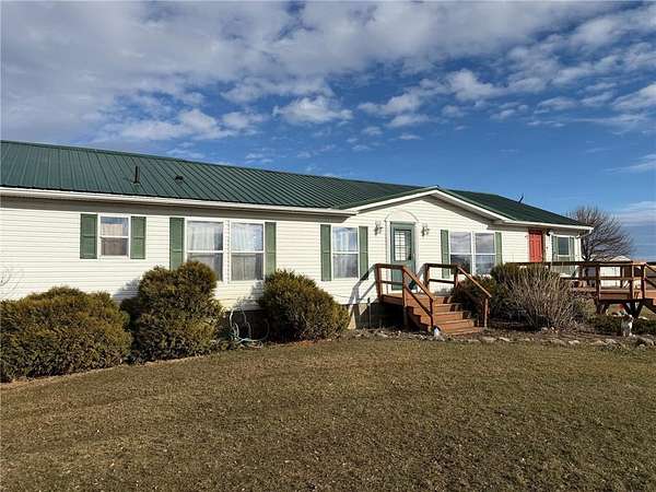 9.18 Acres of Land with Home for Sale in Benson, Minnesota