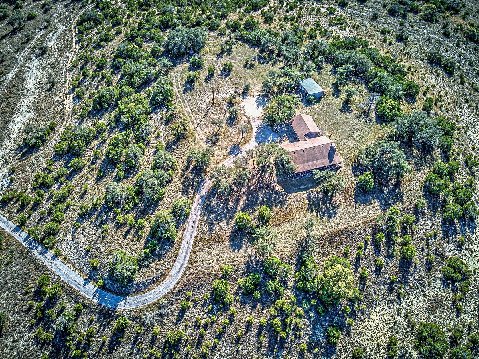 19.2 Acres of Land with Home for Sale in Spicewood, Texas
