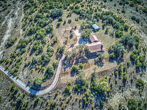 19.2 Acres of Land with Home for Sale in Spicewood, Texas