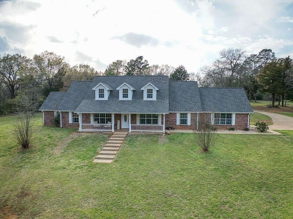 4.89 Acres of Land with Home for Sale in Palestine, Texas