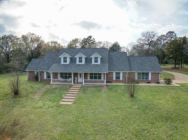 4.89 Acres of Land with Home for Sale in Palestine, Texas