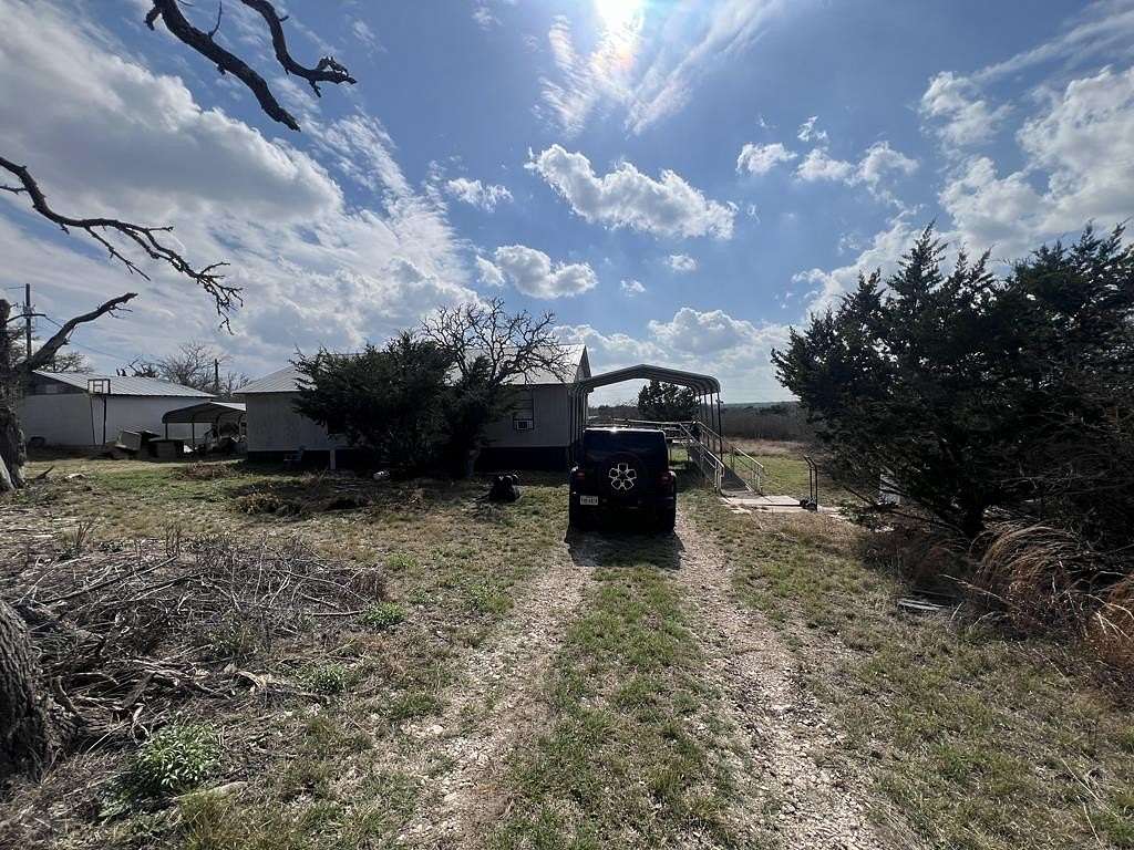 10 Acres of Land with Home for Sale in Mountain Home, Texas