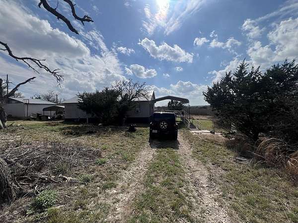 10 Acres of Land with Home for Sale in Mountain Home, Texas