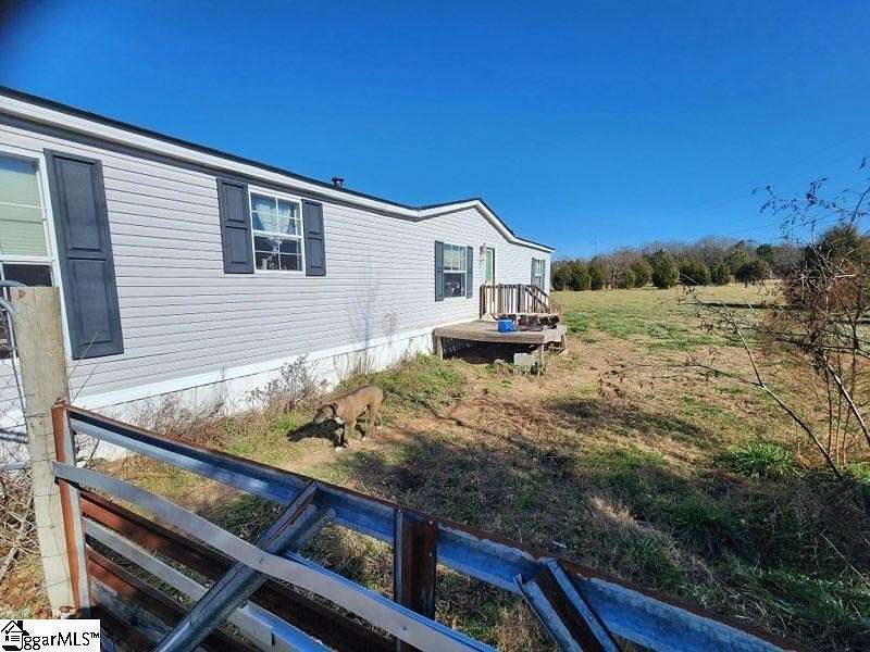 5.2 Acres of Land with Home for Sale in Belton, South Carolina