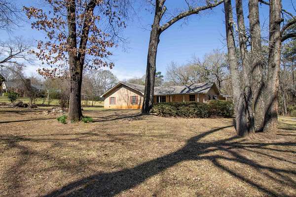 6.4 Acres of Land with Home for Sale in Longview, Texas