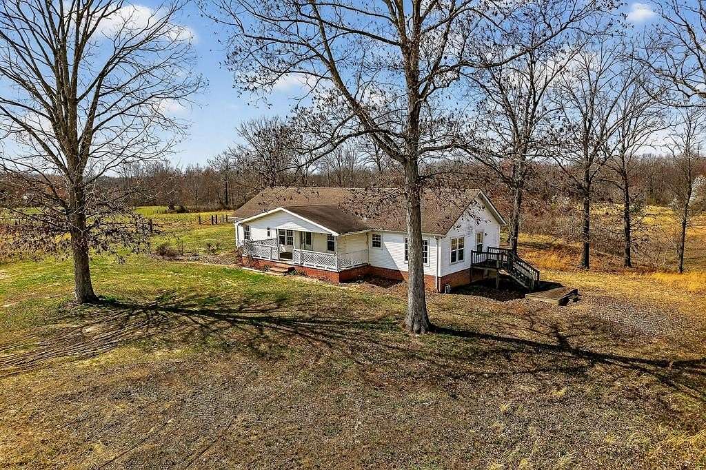 15.9 Acres of Land with Home for Sale in Sparta, Tennessee