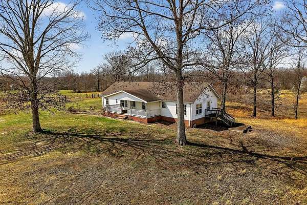 15.9 Acres of Land with Home for Sale in Sparta, Tennessee