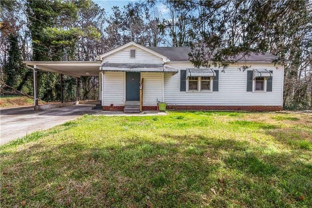 3.15 Acres of Land with Home for Sale in Austell, Georgia