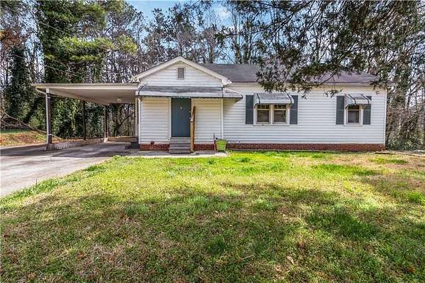 3.15 Acres of Land with Home for Sale in Austell, Georgia