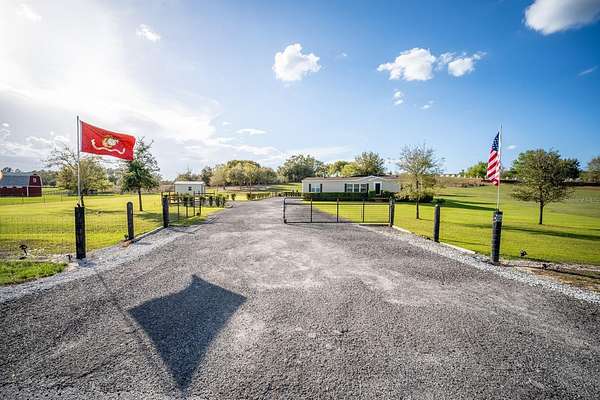 3 Acres of Land with Home for Sale in Howey-in-the-Hills, Florida