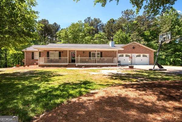 5 Acres of Land with Home for Sale in Hoschton, Georgia