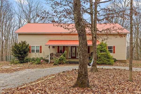 6.76 Acres of Land with Home for Sale in Pikeville, Tennessee