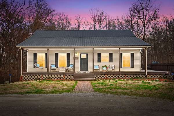 6 Acres of Land with Home for Sale in Cedar Hill, Tennessee