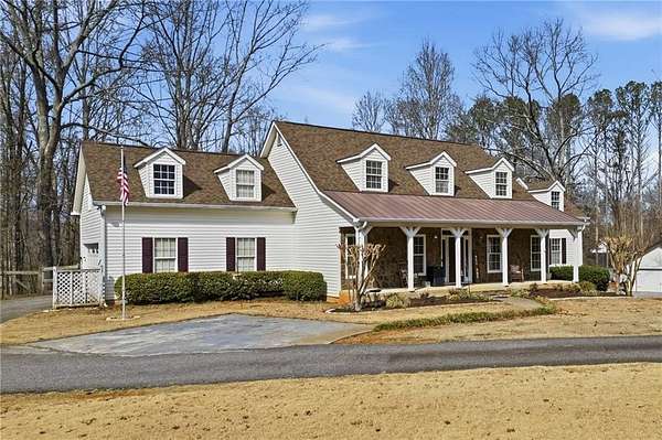 3.17 Acres of Land with Home for Sale in Ball Ground, Georgia