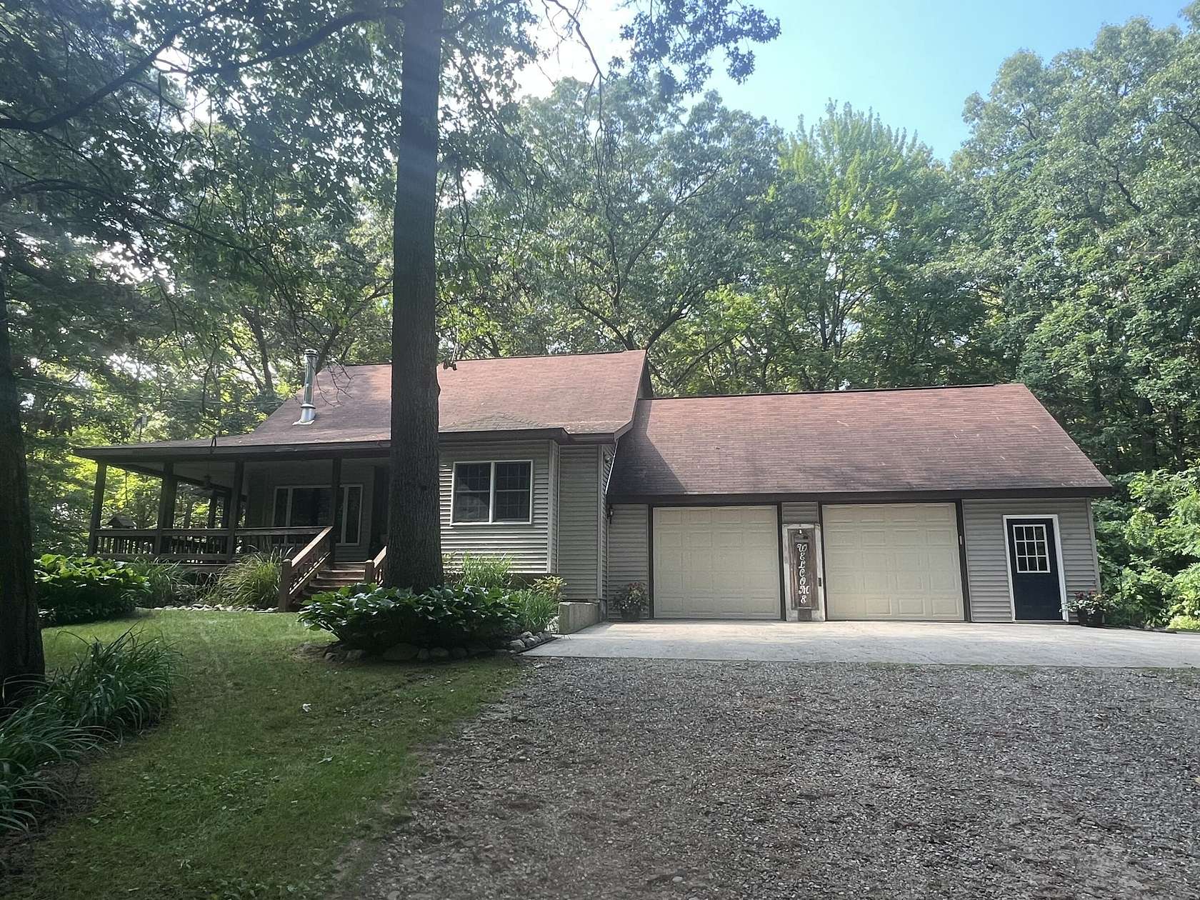 4 Acres of Land with Home for Sale in Grant, Michigan