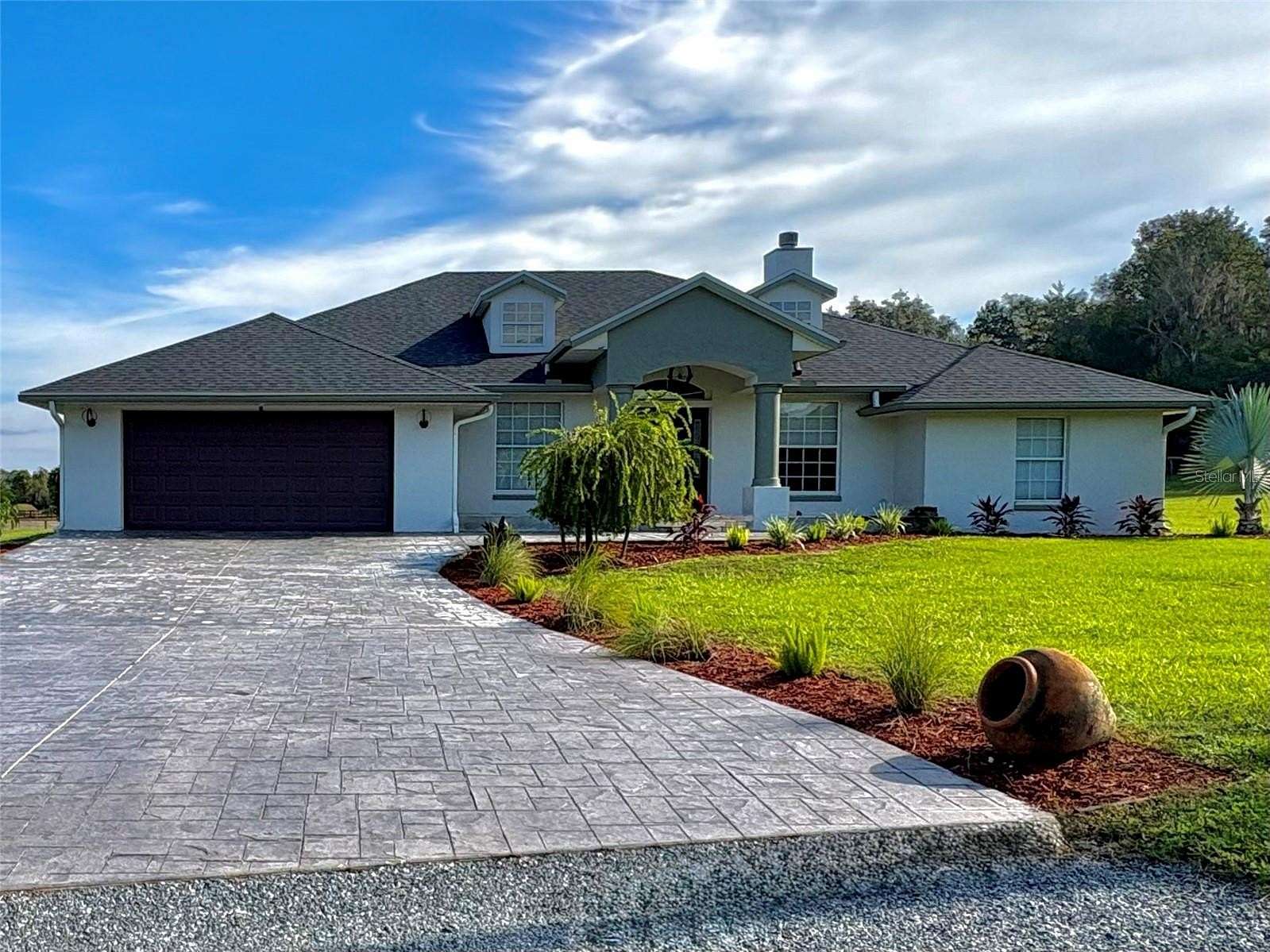 12.5 Acres of Land with Home for Sale in Reddick, Florida