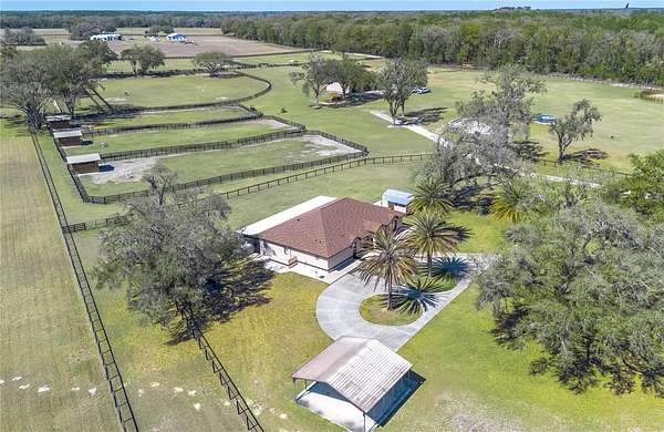 27 Acres of Agricultural Land with Home for Sale in Morriston, Florida