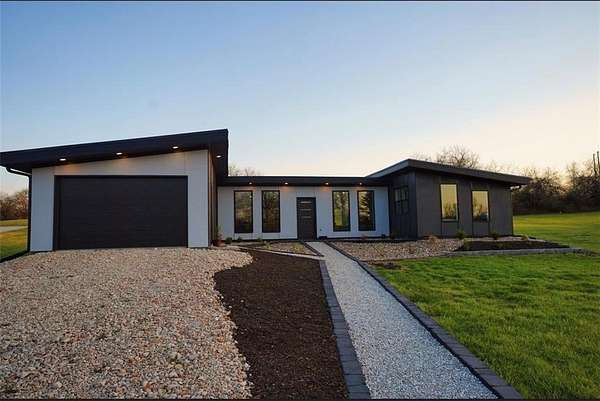 5.88 Acres of Land with Home for Sale in Harrisonville, Missouri