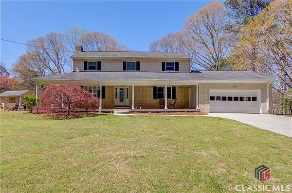 10.4 Acres of Land with Home for Sale in Auburn, Georgia