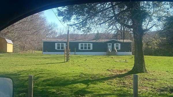 5 Acres of Land with Home for Sale in Danese, West Virginia