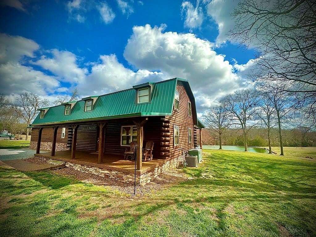 20 Acres of Recreational Land with Home for Sale in Holladay, Tennessee