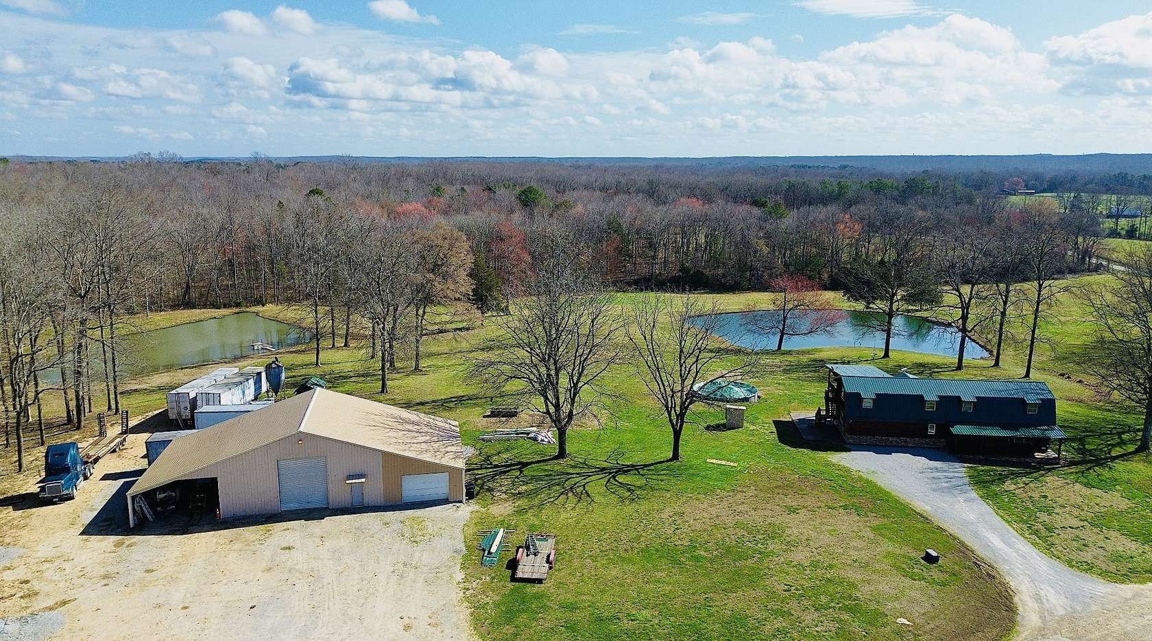 20 Acres of Recreational Land with Home for Sale in Holladay, Tennessee
