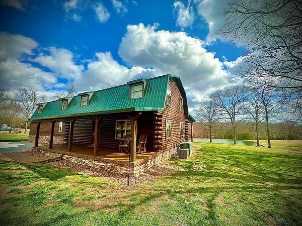 20 Acres of Recreational Land with Home for Sale in Holladay, Tennessee