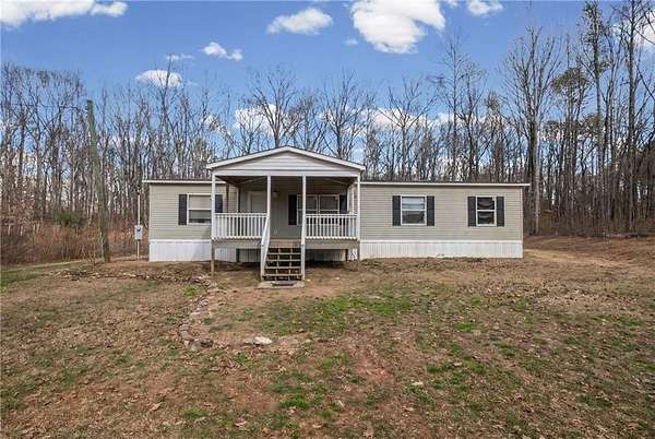 6 Acres of Land with Home for Sale in Canton, Georgia