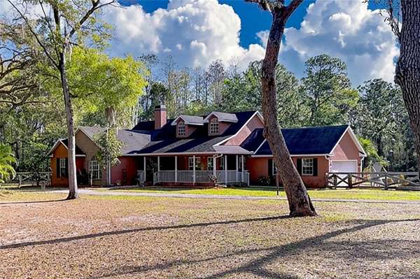 2.76 Acres of Land with Home for Sale in New Port Richey, Florida