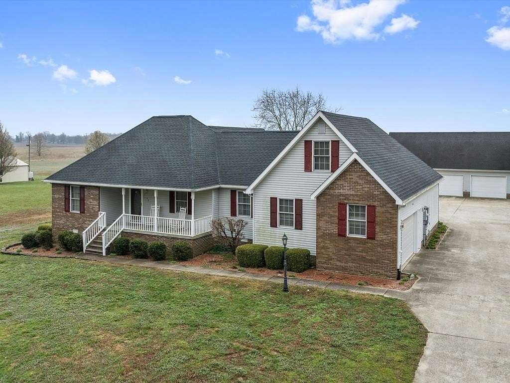 2 Acres of Land with Home for Sale in Madisonville, Kentucky