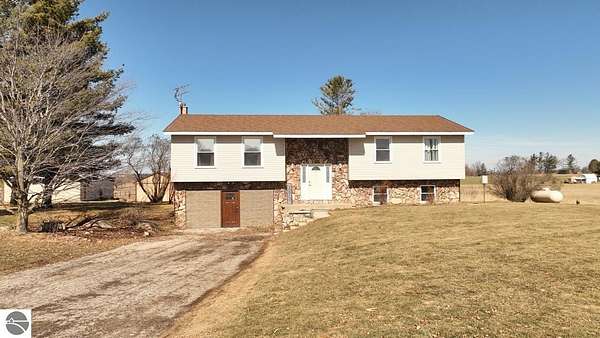 10 Acres of Land with Home for Sale in Clare, Michigan