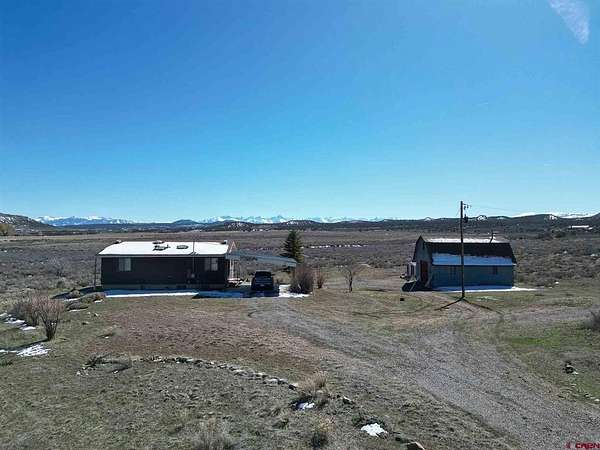 35.9 Acres of Recreational Land with Home for Sale in Montrose, Colorado