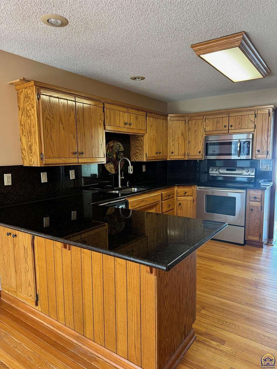 3.12 Acres of Land with Home for Auction in Berryton, Kansas