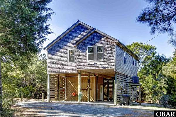 5.87 Acres of Land with Home for Sale in Frisco, North Carolina