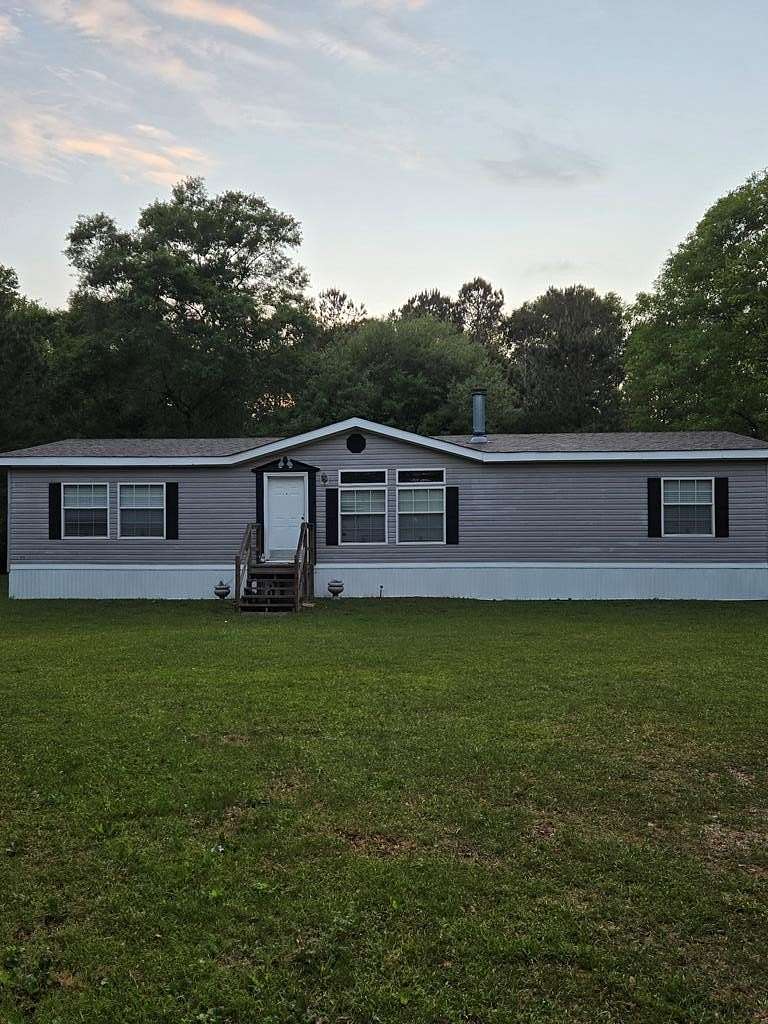 5 Acres of Land with Home for Sale in Carriere, Mississippi