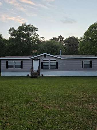 5 Acres of Land with Home for Sale in Carriere, Mississippi