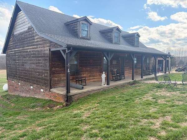 42.4 Acres of Agricultural Land with Home for Sale in Madisonville, Kentucky