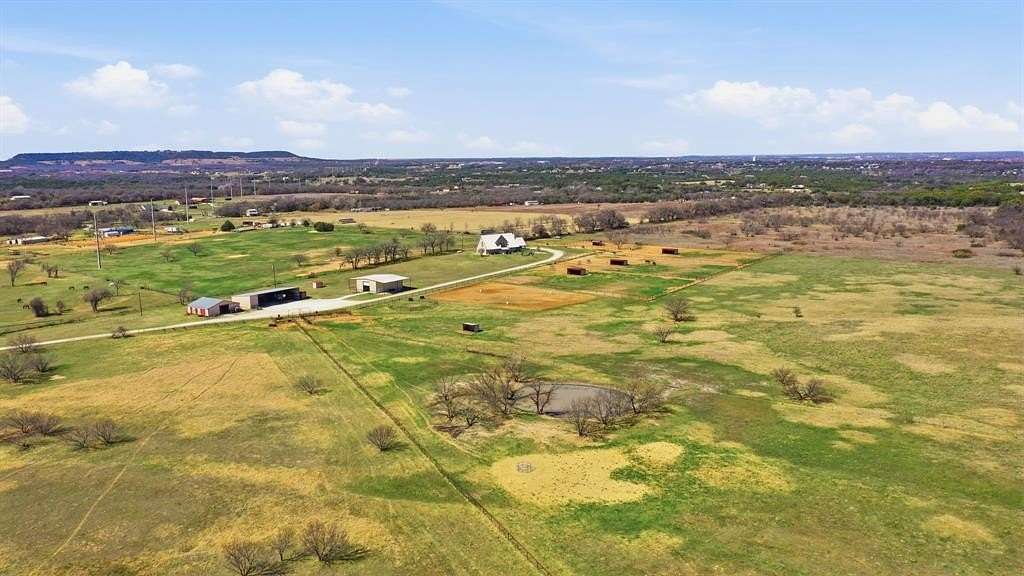 54.2 Acres of Agricultural Land with Home for Sale in Granbury, Texas